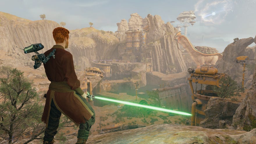 Cal and BD-1 stand on the edge of a cliff overlooking Koboh in Star Wars Jedi: Survivor.